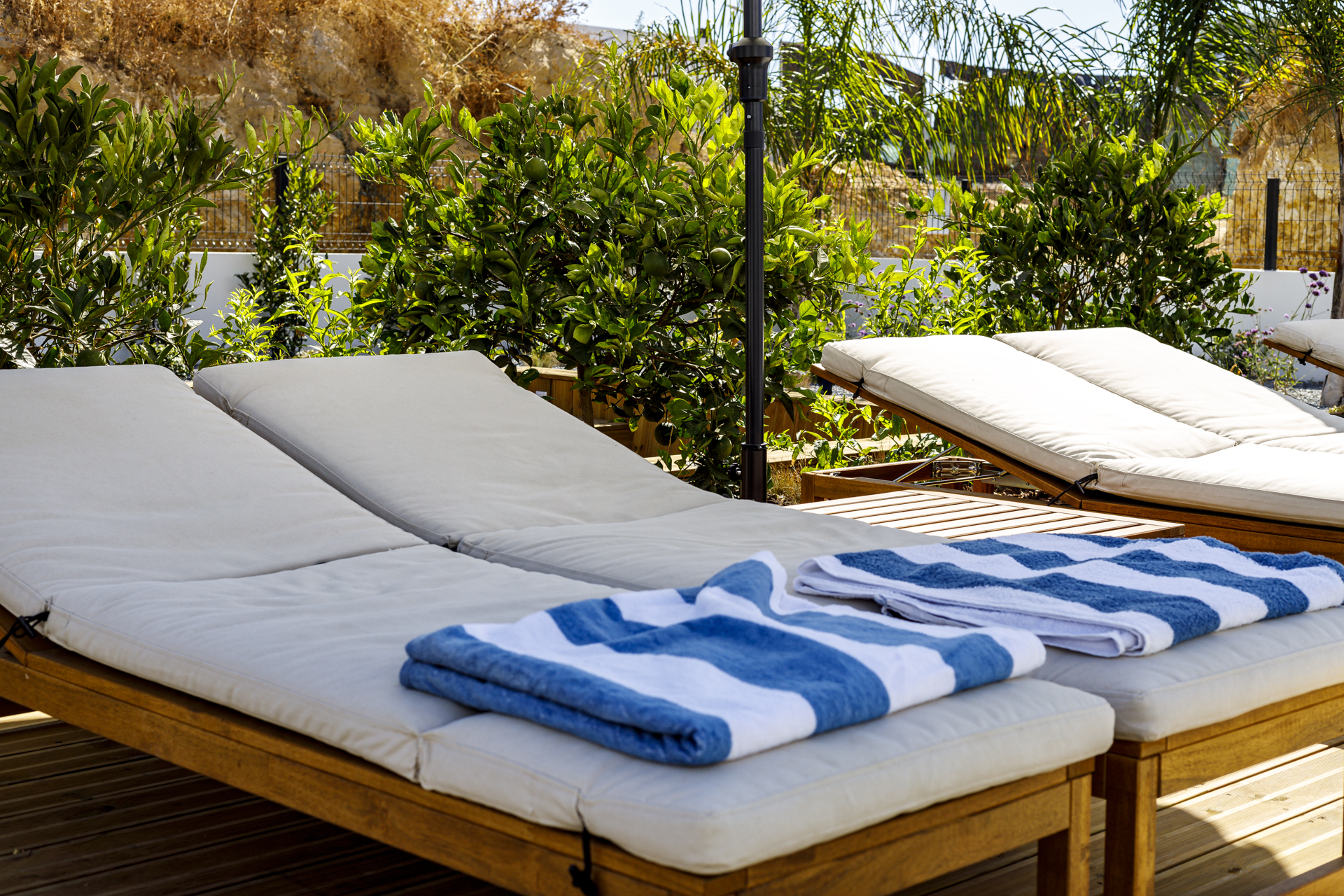 Sunbeds by private pool luxury villa Tavira Algarve